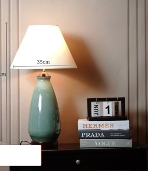 den-ban-gom-su-trang-men-ve-hoa-sen-led-e27-chup-vai-cao-cap-trang-tri-phong-khach-hien-dai-dtt-db-ynt076den-ban-gom-su-trang-men-ve-hoa-sen-led-e27-chup-vai-cao-cap-trang-tri-phong-khach-hien-dai-dtt-db-ynt076