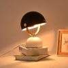 den-ban-hinh-nam-chan-da-chup-kim-loai-led-e27-trang-tri-phong-ngu-phong-cach-co-dien-bac-au-dtt-t025-5
