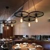 den-led-treo-tran-tha-3-banh-xe-kim-loai-cao-cap-e27-trang-tri-quan-cafe-tra-sua-nha-hang-khach-san-kieu-dang-toi-gian-bac-au-hien-dai-vo-black-cden-led-treo-tran-tha-3-banh-xe-kim-loai-cao-cap-e27-trang-tri-quan-cafe-tra-sua-nha-hang-khach-san-kieu-dang-toi-gian-bac-au-hien-dai-vo-black-cao-cap-dtt-024-3-3o-cap-dtt-024-3-3